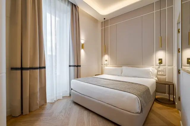 Deluxe Sol-Blick-Zimmer mit Doppelbett und großem Fenster mit Tageslicht