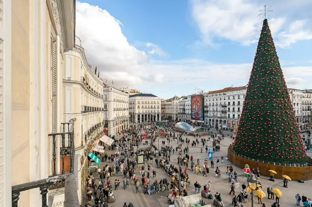 Panoramic view of Christmas tree and Puerta del Sol Madrid from La Fonda de los Príncipes