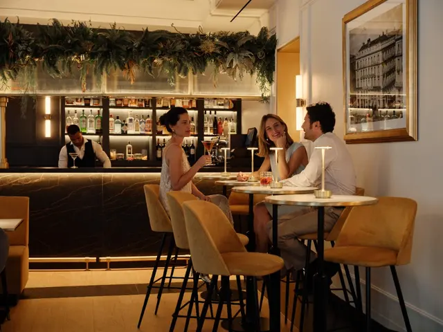Restaurant dining room with natural light and guests at La Fonda de los Príncipes