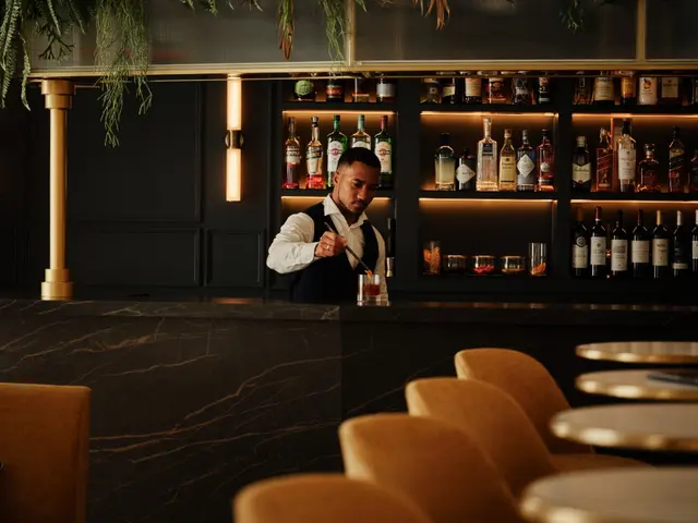 Guests enjoying cocktails at the glamorous bar of La Fonda de los Príncipes